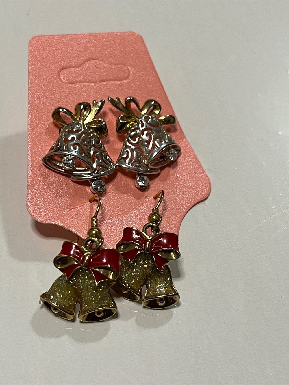 Festive Gold-Tone Bell Earrings with Red Bow Accents